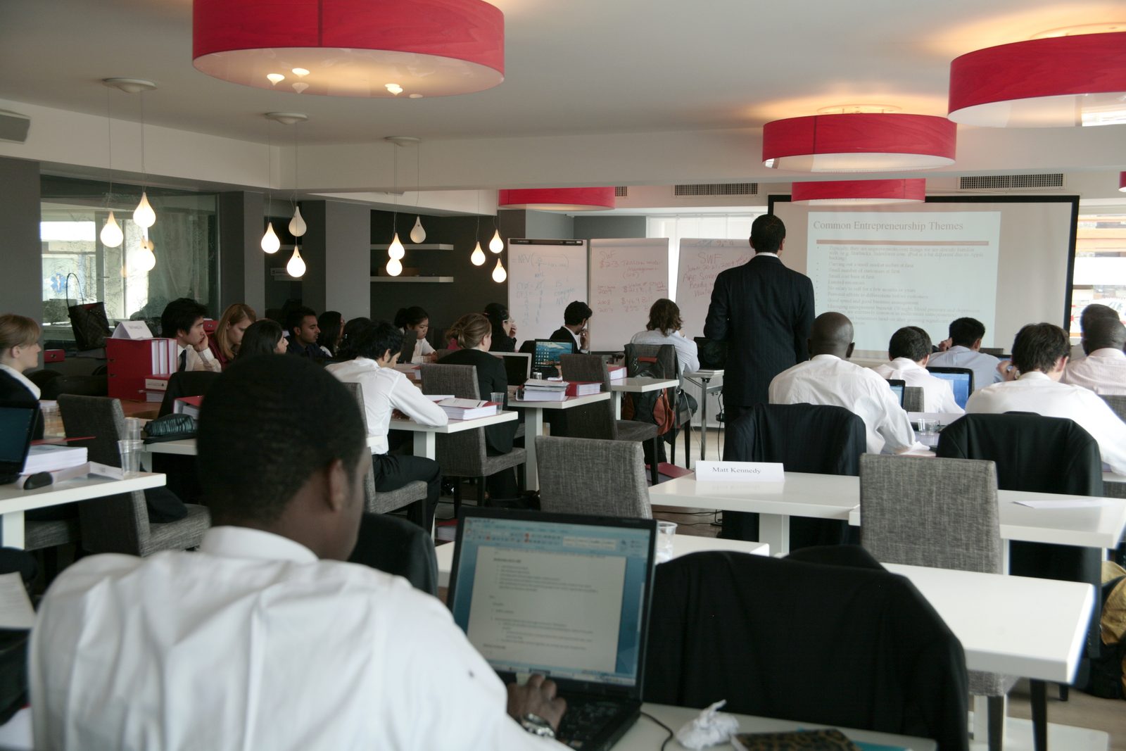 Residents at their workstations during a structured session
